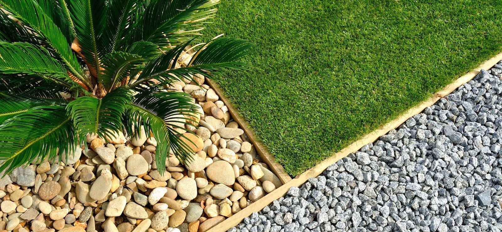 landscaping combinations of grass, plant and stones