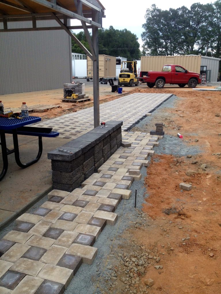 Hardscape services include sidewalks, rock walls and retaining walls